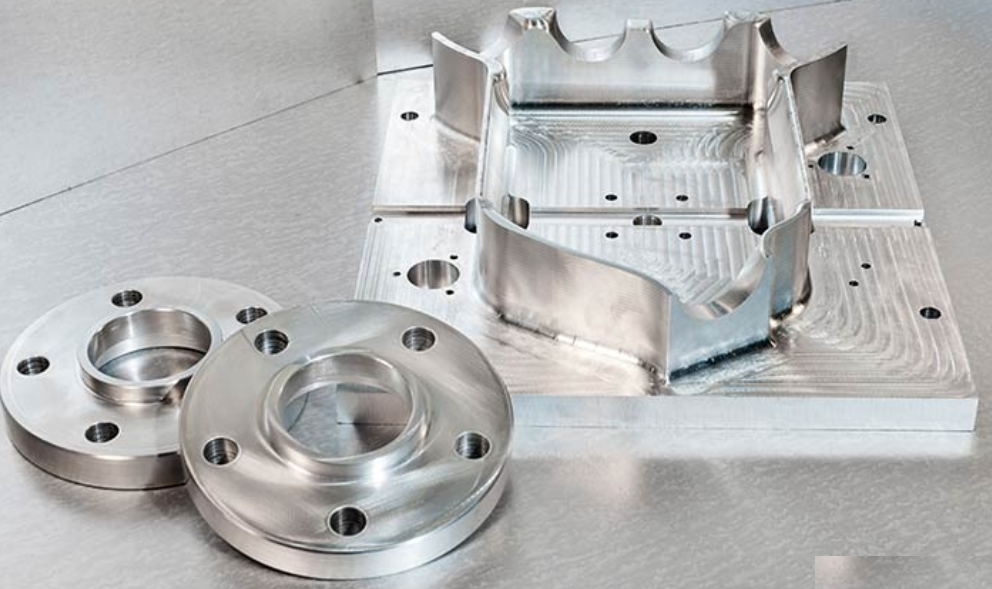 Various precision-engineered metal parts produced by vertical machining center
